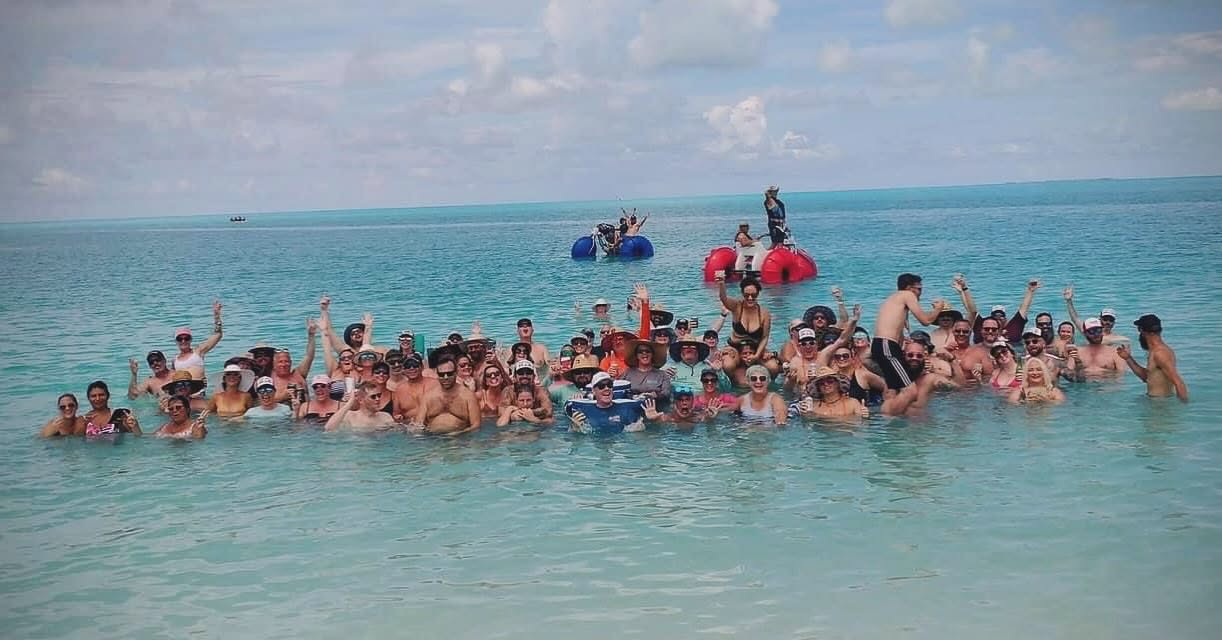 Tom & Dan Cruise listeners in the water at a private island